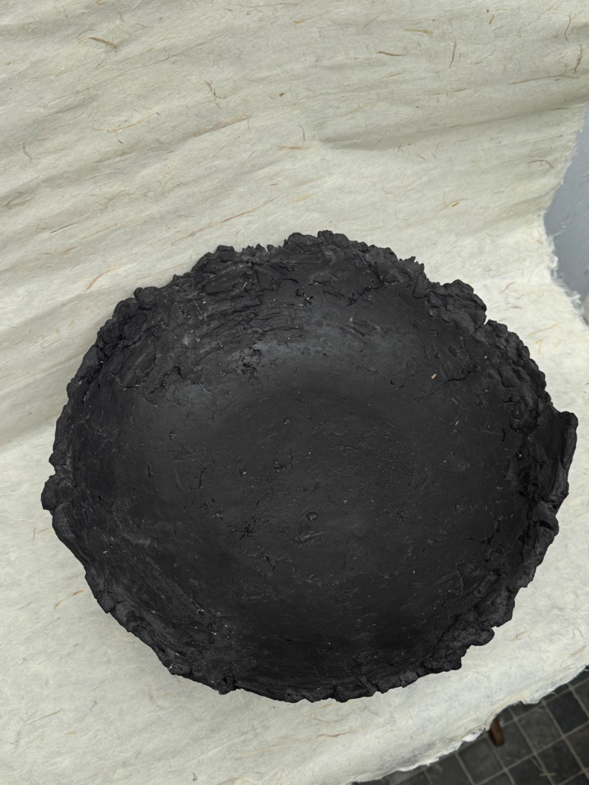 Handmade dark ceramic bowl by Lize Lawn – Lawnware studio pottery